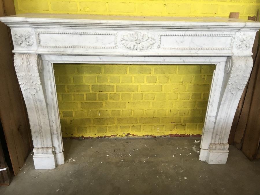 LXI white marble fireplace